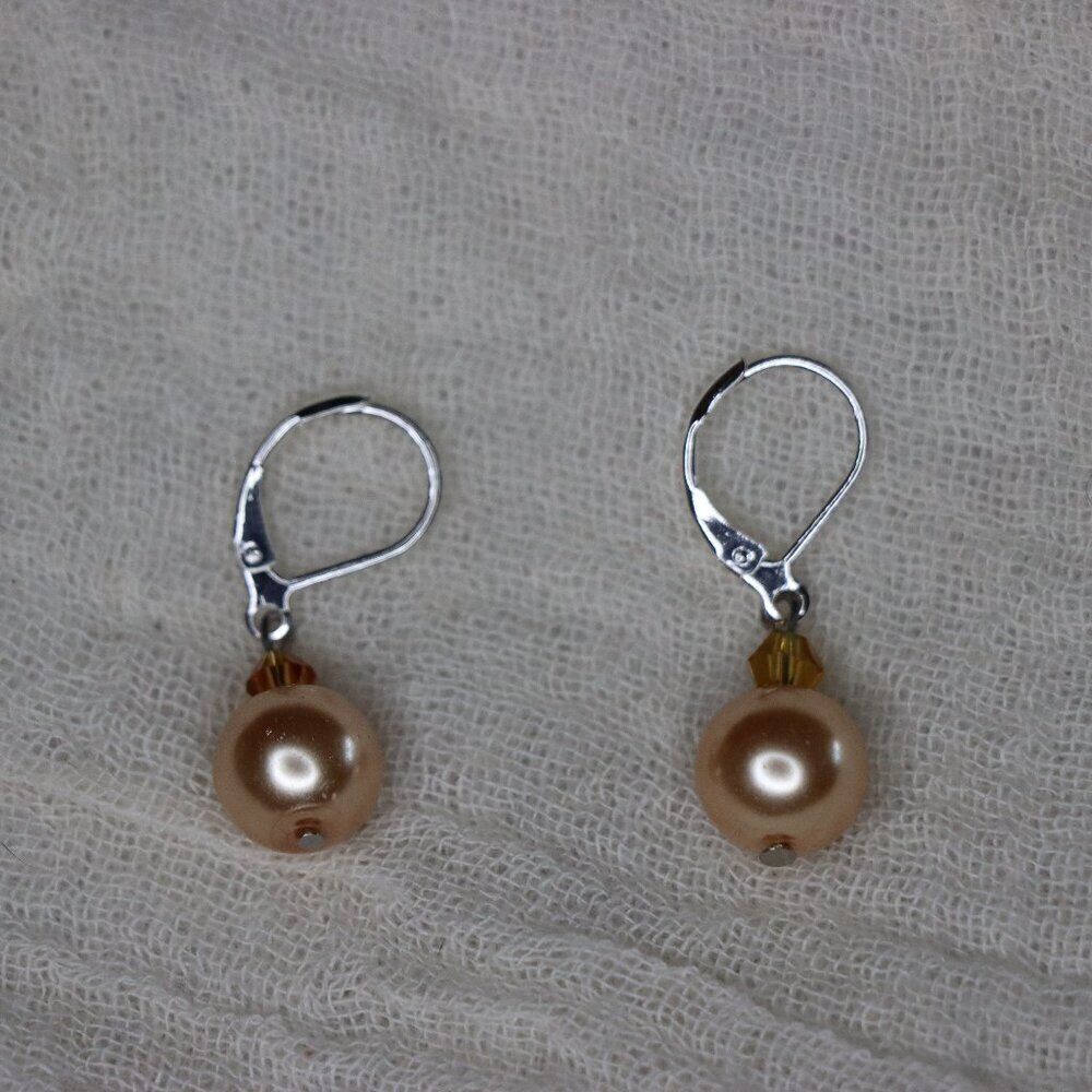 Round Peach Pearl styled drop earrings with silver color loops for pierced ears